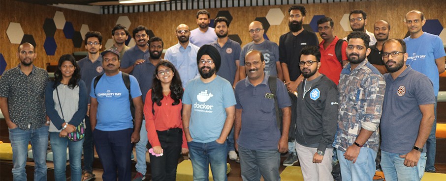 AWS UG Kochi honouring the Docker Captain with a traditional Nettipattam