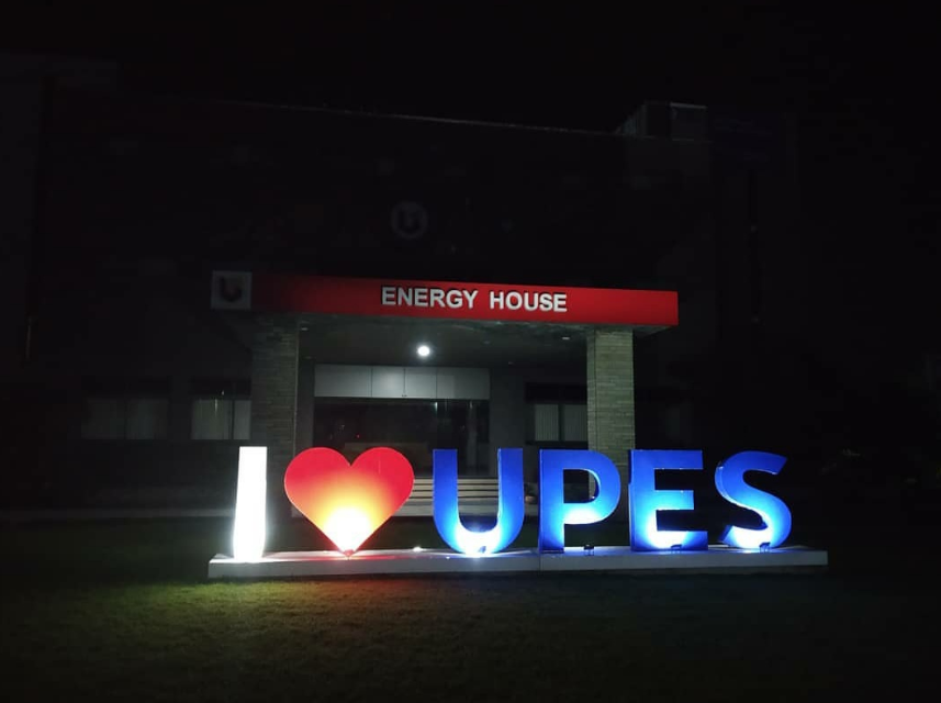 Illuminated I love UPES sign outside Energy House on the UPES Dehradun campus